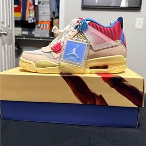 Jordan Athletic Shoes in Cream, Red, and Blue